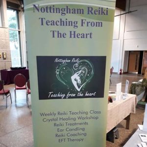 Nottingham Reiki sign detailing services offered.